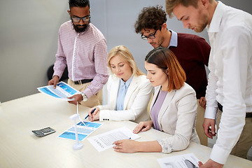 Image showing business people discussing green energy project