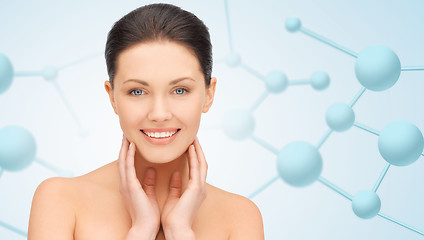 Image showing beautiful young woman face with molecules