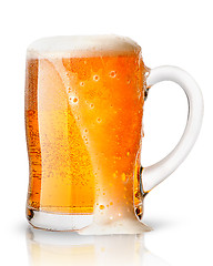 Image showing Light beer with foam in mug
