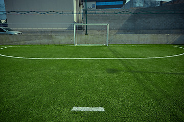 Image showing The empty football field and green grass