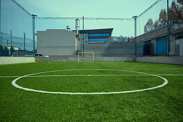 Image showing The empty football field and green grass