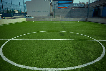 Image showing The empty football field and green grass