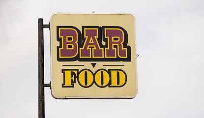 Image showing Rusted Metal Faded Sign Advertising Bar Food