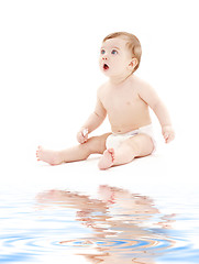 Image showing baby boy in diaper with toothbrush