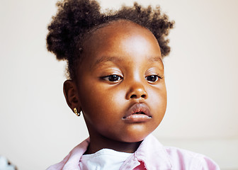 Image showing little cute african american girl playing with animal toys at ho