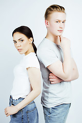 Image showing best friends teenage asian girl and boy together having fun, posing emotional on white background, couple happy smiling, lifestyle people concept, blond and brunette multi nations 