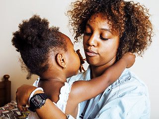 Image showing adorable sweet young afro-american mother with cute little daugh