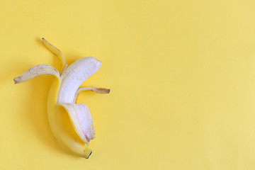 Image showing Ripe banana on yellow background