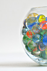 Image showing glass marbles in transparent bowl