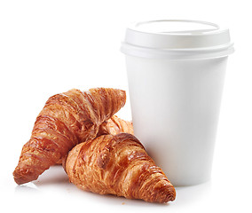 Image showing paper cup of coffee and croissants