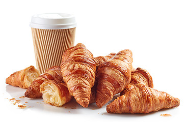 Image showing heap of croissants and paper coffee cup