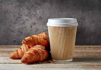 Image showing paper coffee cup and croissants