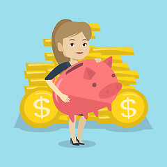 Image showing Business woman holding big piggy bank.