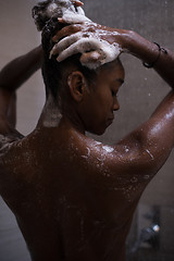 Image showing African American woman in the shower