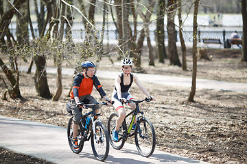 Image showing Cyclists in helmet at park