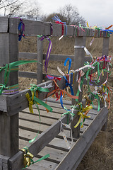 Image showing Bridge desires railing tied with colored ribbons