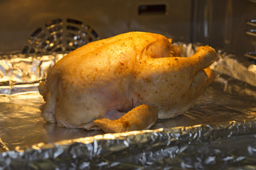 Image showing Cooking delicious of roasted chicken in the oven
