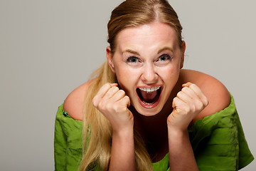 Image showing Screaming model in green dress
