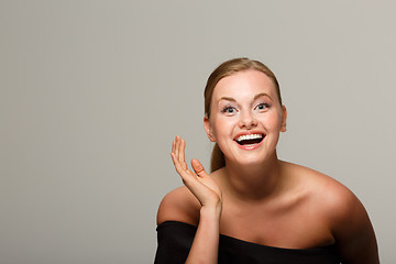 Image showing Smiling model in black dress