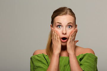 Image showing Young girl in green sweater