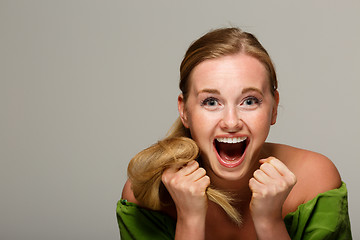 Image showing Screaming woman with bare shoulders