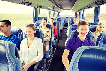 Image showing group of happy passengers in travel bus