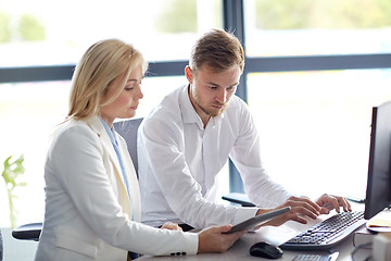 Image showing business team with tablet pc computer at office