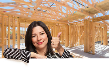 Image showing Hispanic Woman With Thumbs Up On Site Inside New Home Constructi