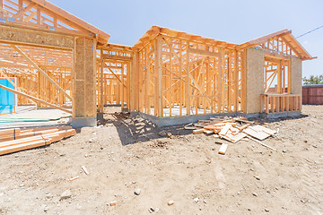 Image showing Wood Home Framing Abstract At Construction Site.