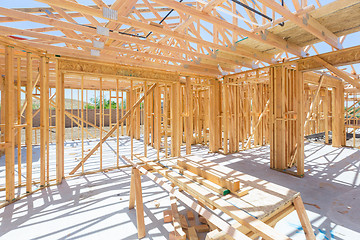 Image showing Wood Home Framing Abstract At Construction Site.