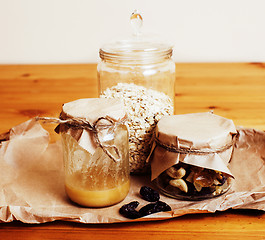 Image showing real comfort wooden kitchen with breakfast ingredients close up 