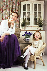 Image showing young mother with daughter at luxury home interior vintage