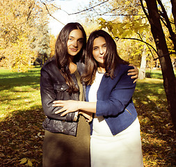 Image showing mature real mother with daughter outside autumn fall in park