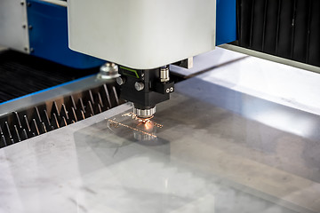 Image showing CNC Laser cutting of metal, modern industrial technology.