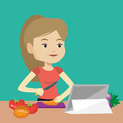 Image showing Woman cooking healthy vegetable salad.