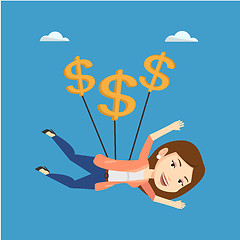 Image showing Business woman flying with dollar signs.
