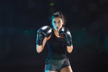 Image showing The female boxer training at sport club