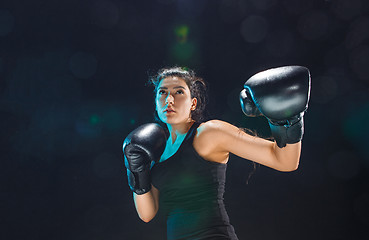 Image showing The female boxer training at sport club