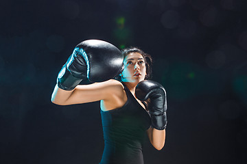 Image showing The female boxer training at sport club