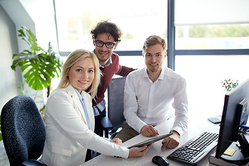 Image showing business team with tablet pc at office
