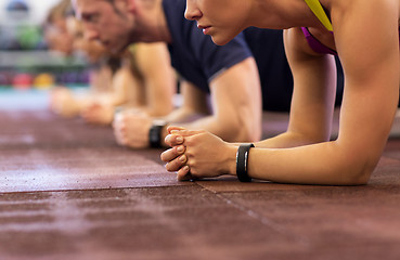 Image showing group of people exercising in gym