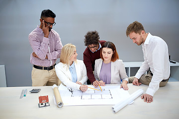 Image showing business team discussing house project at office