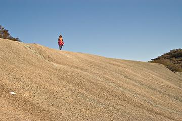 Image showing on top the rock