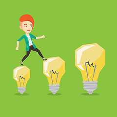 Image showing Business woman jumping on light bulbs.