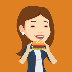 Image showing Woman eating hamburger vector illustration.