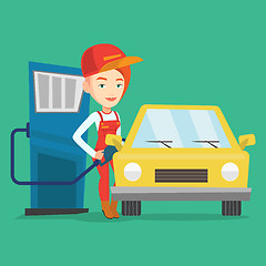 Image showing Worker filling up fuel into car.