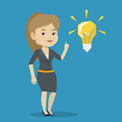 Image showing Student pointing at idea bulb vector illustration