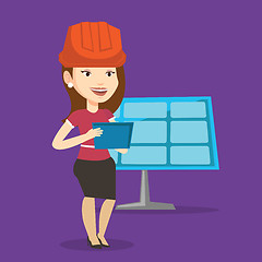 Image showing Female worker of solar power plant.