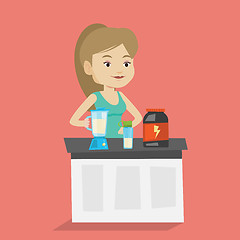 Image showing Young woman making protein cocktail.