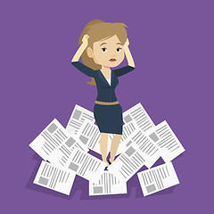 Image showing Stressed business woman having lots of work to do.